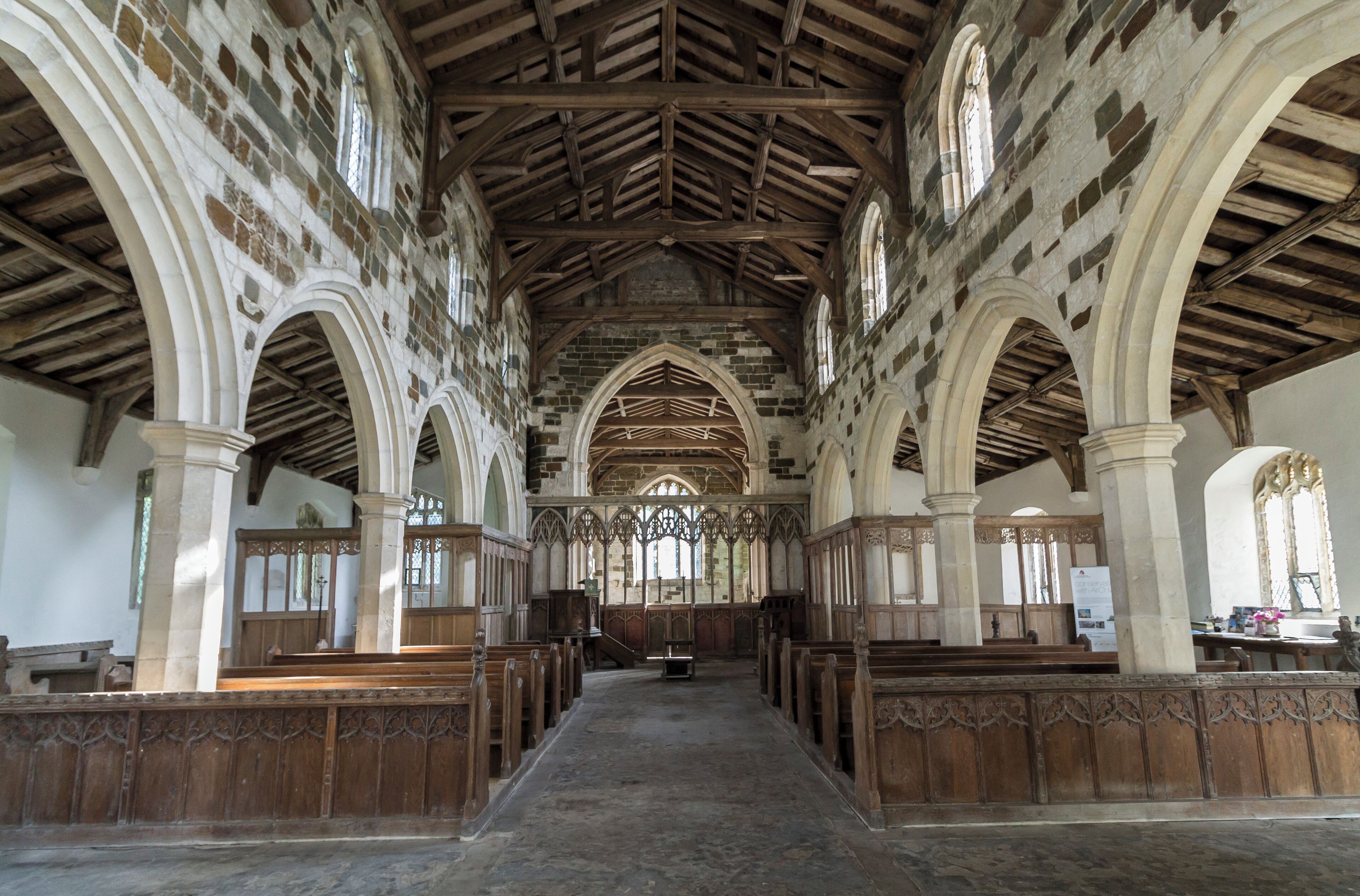 The church was made redundant in 1971 and is cared for by the Churches Conservation Trust. Extensive repairs and renewals have been carried out in recent years. The church dates from the 12th century onwards, with some Norman work on the north side. The rest of the church dates from around 1380 to 1400. There is extensive brick patching from the 17th century. The church was restored the in 1866, the chancel and tower somewhat later. It consists of a western tower, nave with north and south aisles and clerestory, chancel, and south porch. Outside, the church is battlemented with pinnacles and gargoyles, with much evidence of the brick patching. Inside, the nave has north and south arcades of five bays with octagonal piers. The stone used is both dark and pale coloured which gives a pleasing chequered effect. The nave roof was restored in the 19th century. Both aisles have carved wooden parclose screens from around 1535 with faces and a coat of arms of the Angevine family. The Rood screen has remains of coloured paint on it. At the east end of the north aisle there is a mediaeval altar stone, however there is a large crack running through the floor and wall. The south Chapel has an ornate carved stone reredos. There is also a brass to Robert Hayton, died 1424, and a matrix for another brass, the figures are missing. The chancel has a marble altar table, sedilia and piscina. There is also a monument to Charles Bertie, died 1727.