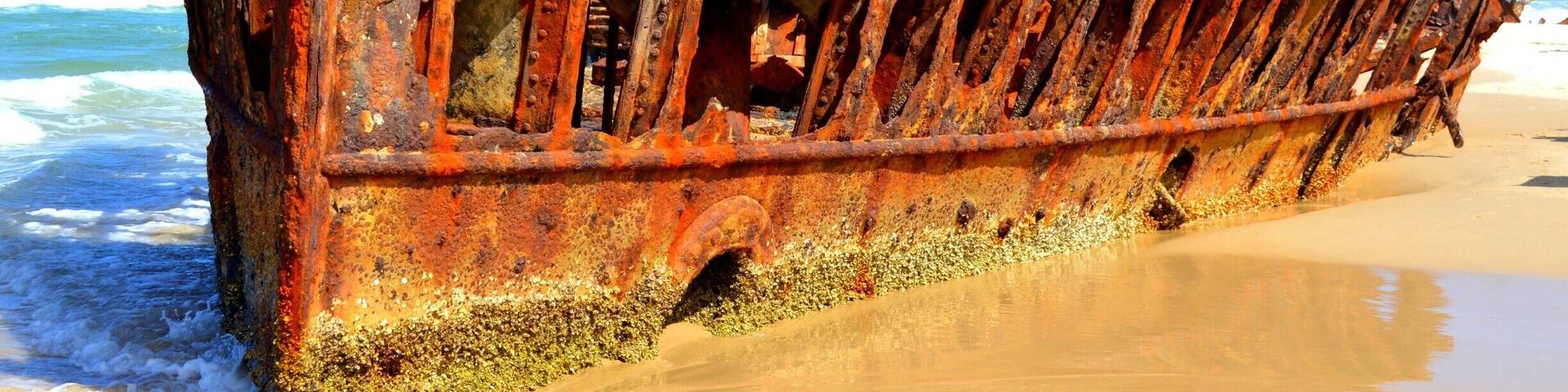 SS Maheno shipwreck. The ship was an ocean liner that travelled between New Zealand and Australia as a medical ship during World War 1. It is a very impressive wreck and a photographers delight to shoot during the afternoon light.