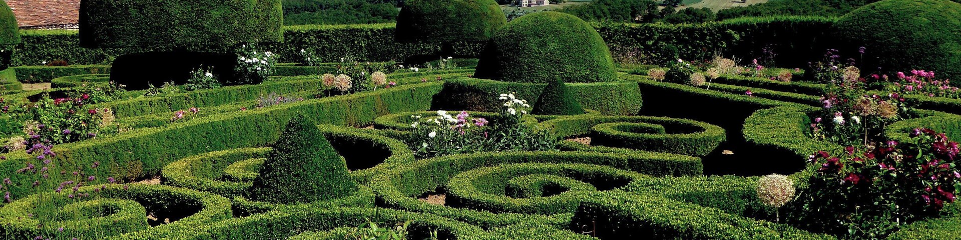 The Chateau de Hautefort has been beautifully restored inside, but it's outside  in the garden that you'll see the most beauty.