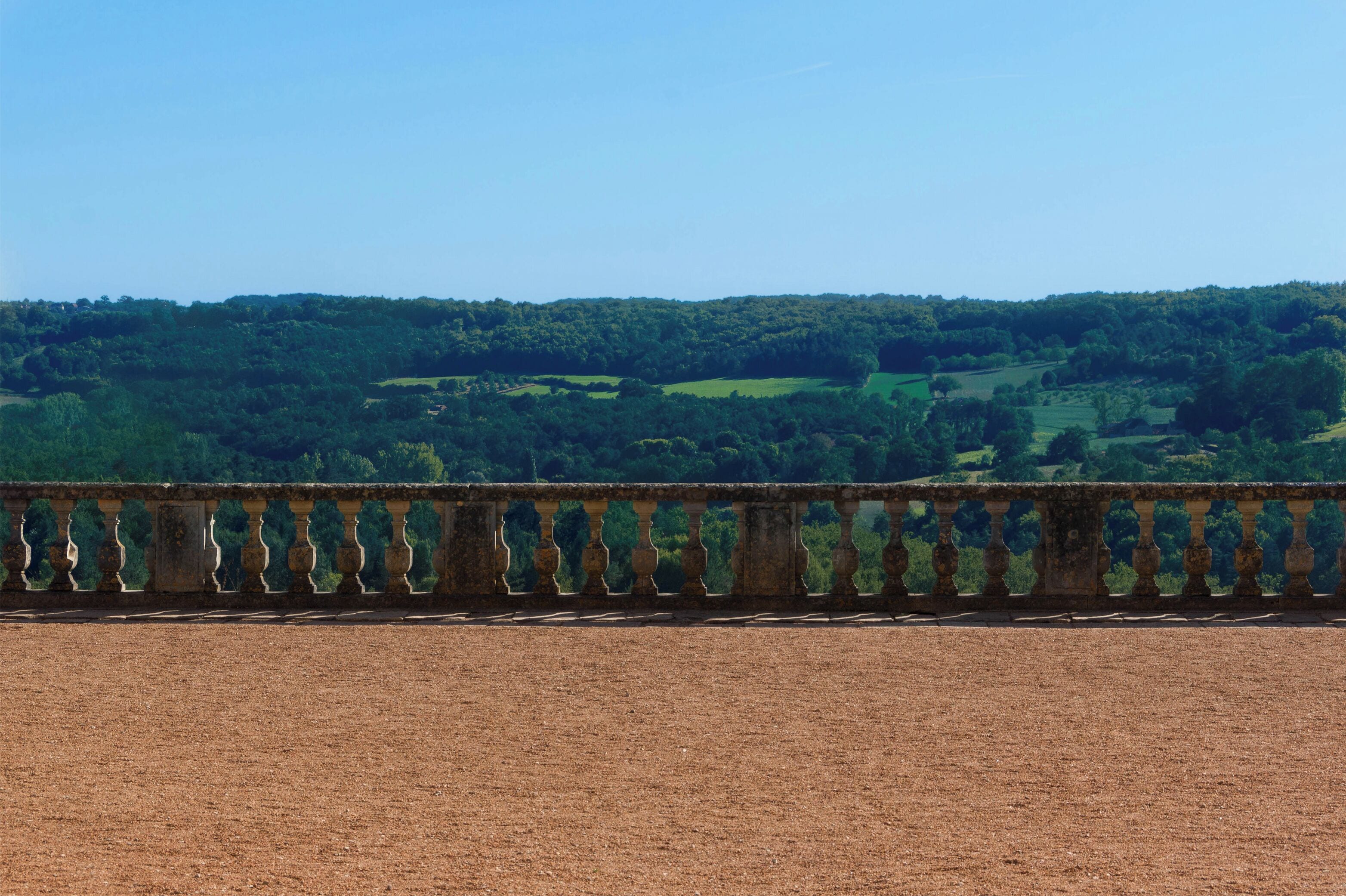 A balustrade, main courtyard of Château de Hautefort, Dordogne, France.