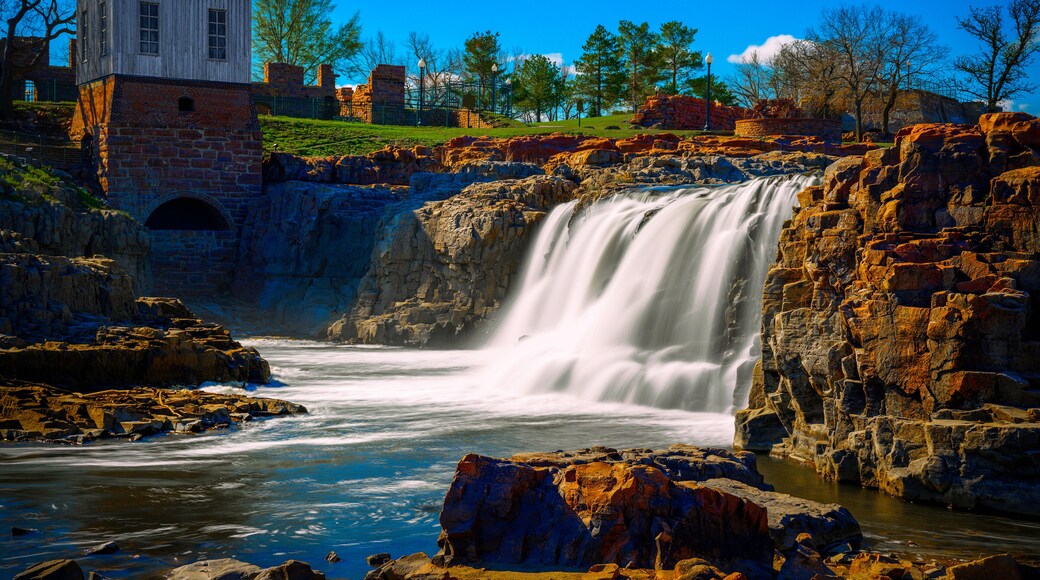 Sioux Falls City Spring Landscape at the Falls Park in Sioux Falls, South Dakota, USA, silky water falling over quartzite and pipestone rock formations in the Big Sioux River