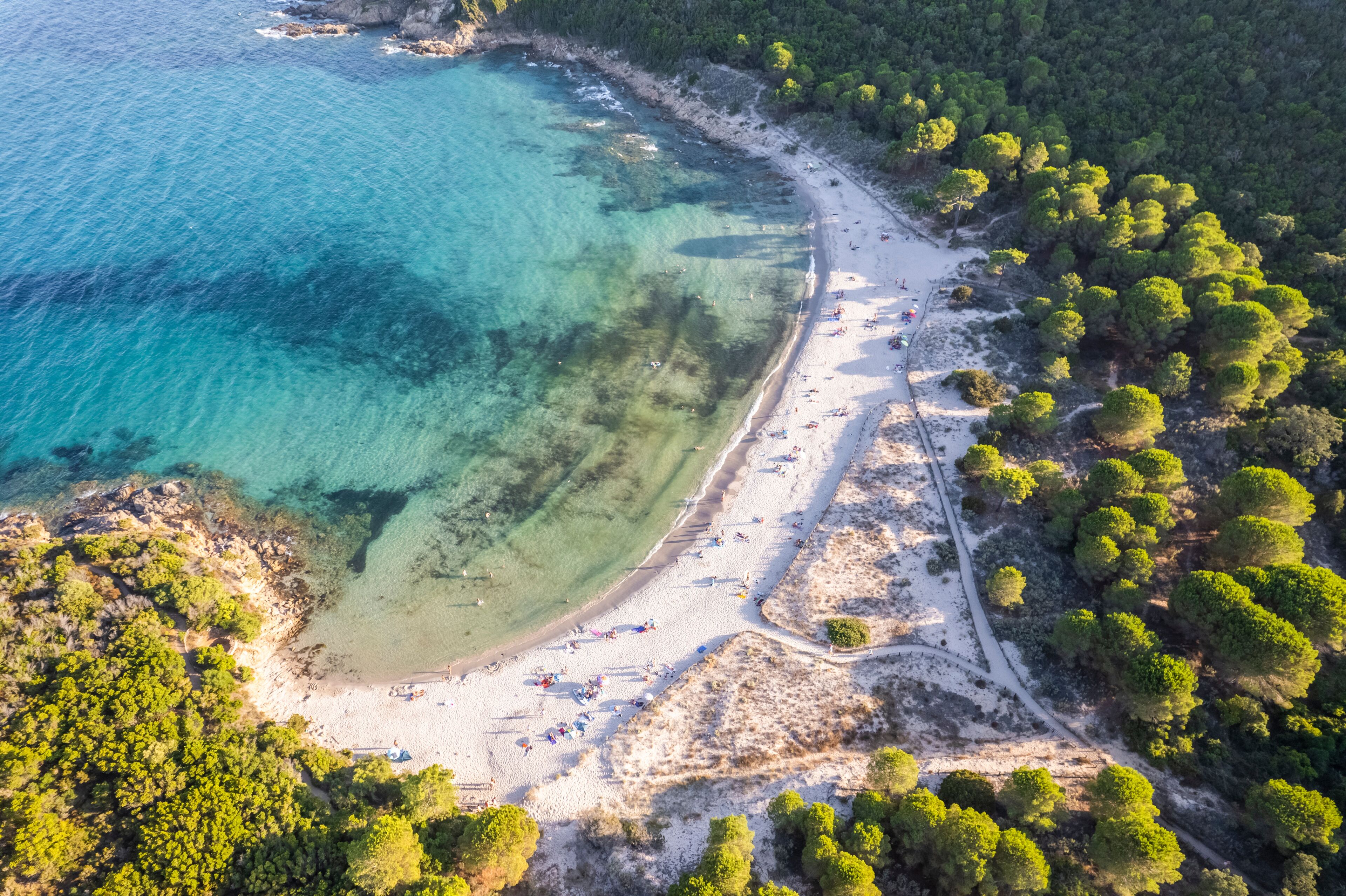 Aerial view of Fautea beach along the coast in summertime, Corse island, France.