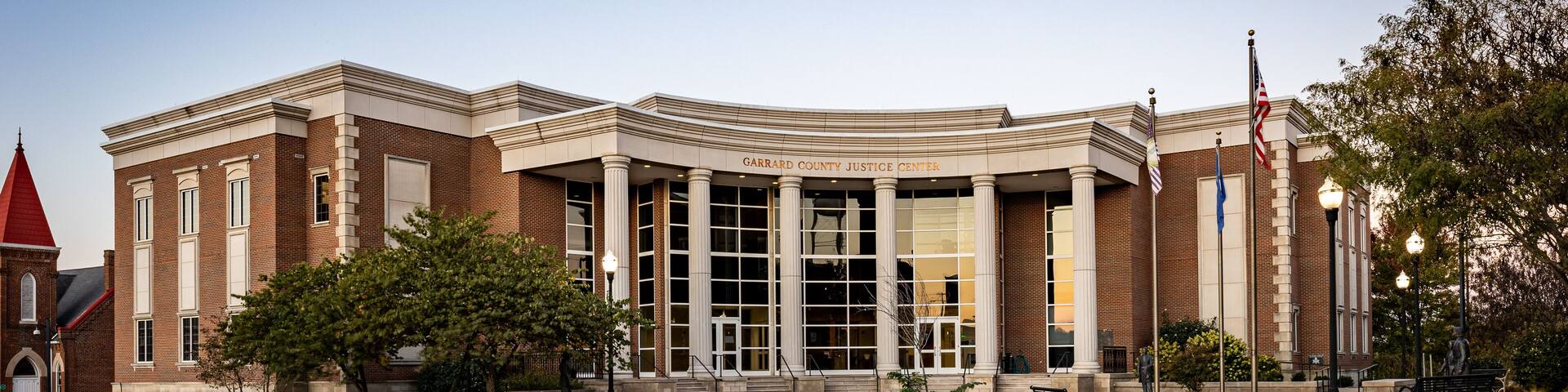 Road and moving traffic in front of Garrard county justice center in Lancaster, Kentucky