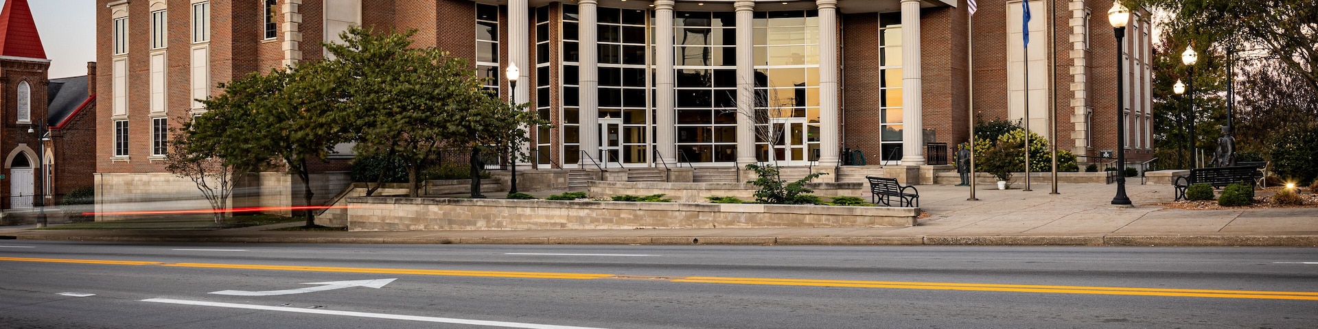 Road and moving traffic in front of Garrard county justice center in Lancaster, Kentucky