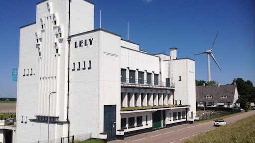 Seemingly random along the Dutch dikes you will find structures like this, which hide a pumping station. Named after Cornelis Lely, one of many who changed the Zuiderzee into the IJsselmeer.
Many buildings are plain ugly by all possible definitions, this one is a nice exception. Style: New pragmatism. They are even more impressive when they engines are running. - No Holland without them! #greatdesign