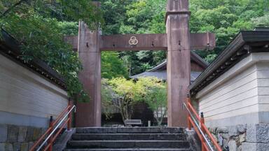 Entrance to traditional japanese temple with torii gate in ryu-senji,nara.
