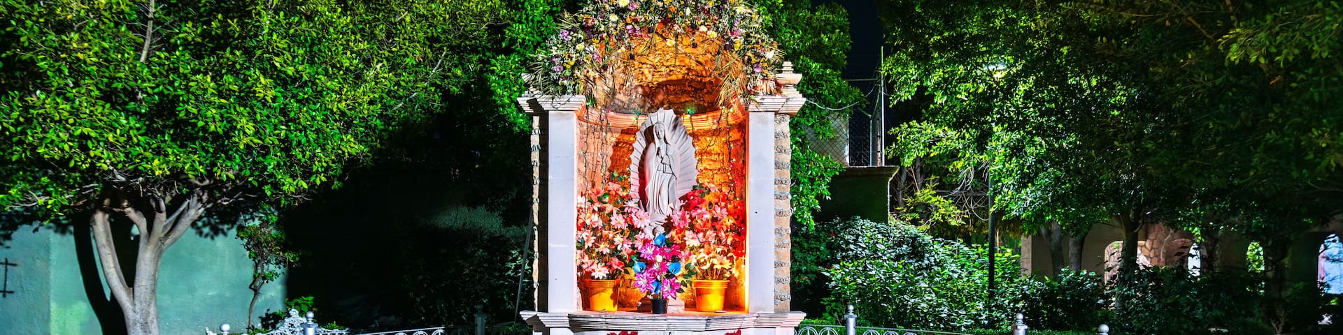 Statue of Our Lady of Guadalupe in Aguascalientes, Mexico at night