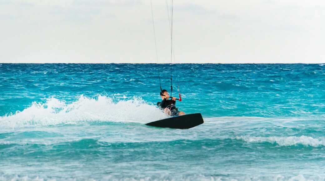 kiteboarder kitesurfer athlete performing kitesurfing kiteboarding tricks unhoocked
