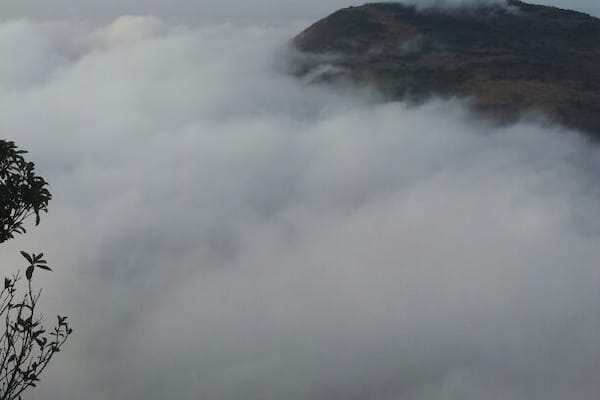 Floating clouds above Nandi hills. It is an ancient hill fortress in Souther India, approx 60 kilometers from the city of Bangalore. Its elevation is 4849 ft.