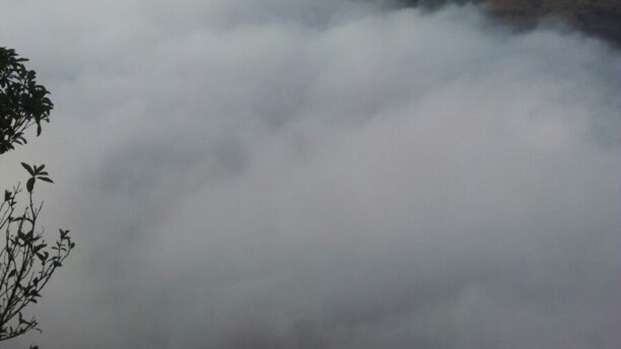 Floating clouds above Nandi hills. It is an ancient hill fortress in Souther India, approx 60 kilometers from the city of Bangalore. Its elevation is 4849 ft.