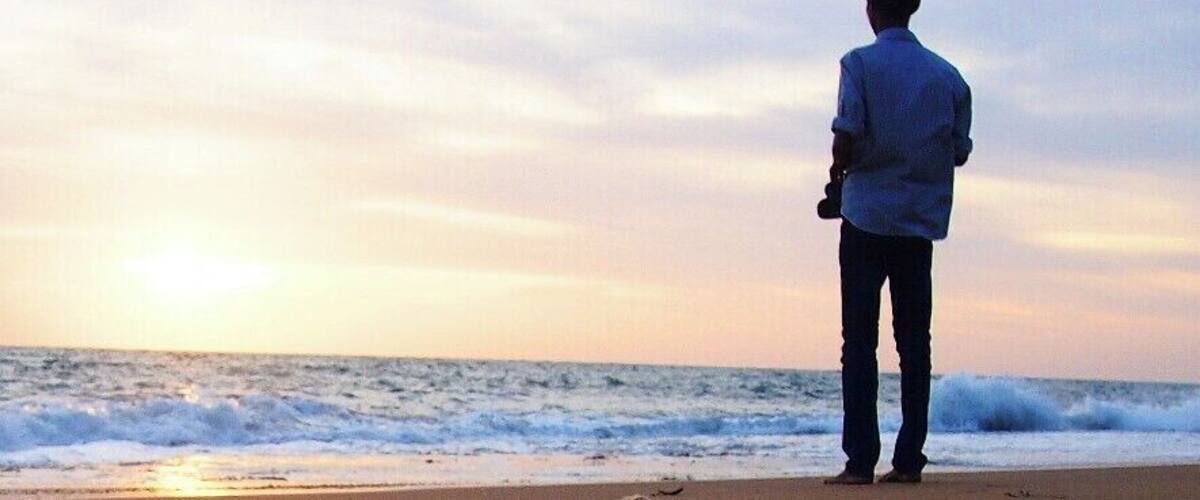 Another evening of our long road trip at Kalpitiya Beach. It is my travelling mate is posing on the picture. When we reached Kalpitiya, we were too tired and fed up of walking. We relaxed well in the beach.
Kalpitiya is well known for Kite surfing, Whale watching and boat riding. There are several small islands in Kalpitiya and camping in them is one in a life time experience.