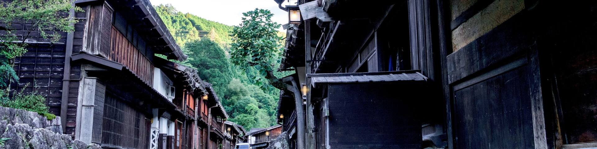 Kiso valley is the old town or Japanese traditional wooden buildings for the travelers walking at historic old street in Narai-juku , Nagano Prefecture, JAPAN.