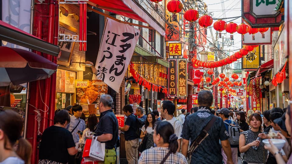Chinatown which includes signage, a city and street scenes