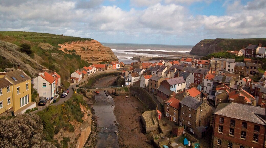 From the viewpoint at the top of the hill looking down onto the village of Staithes North Yorkshire which is just north of Whitby. A very old fishing village you go there you enter year past..