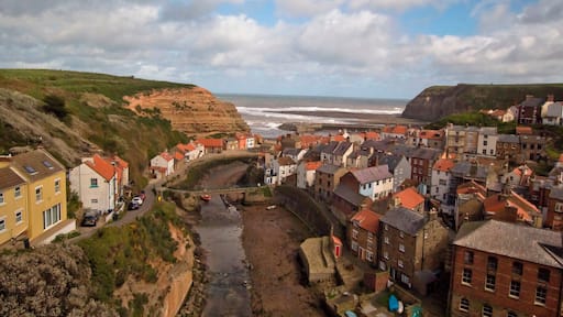 From the viewpoint at the top of the hill looking down onto the village of Staithes North Yorkshire which is just north of Whitby. A very old fishing village you go there you enter year past..