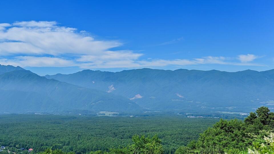 A mountainous landscape with a clear sky.