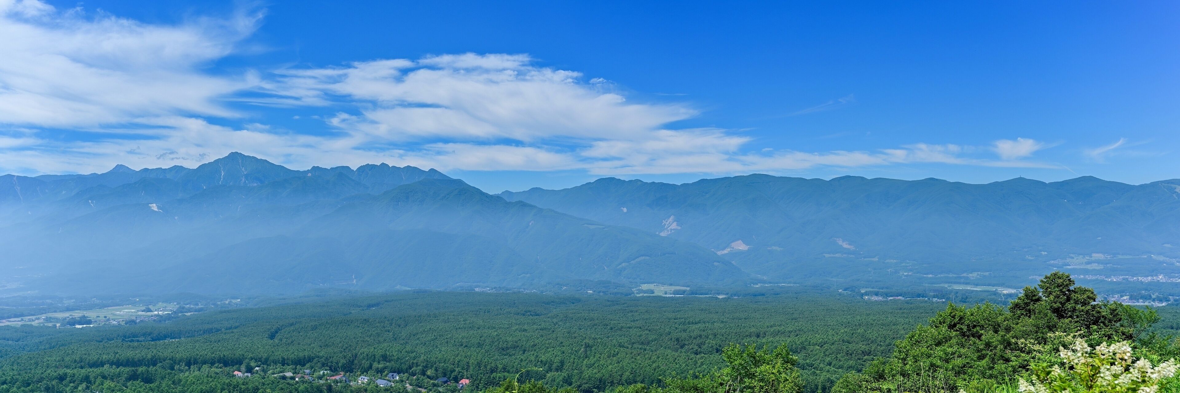 A mountainous landscape with a clear sky.