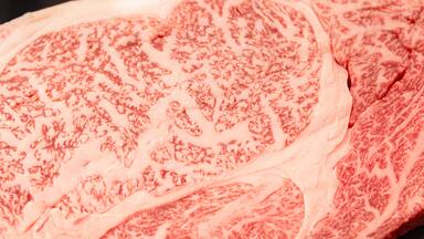 Highly marbled fat texture of Japanese wagyu beef steak in uncooked raw condition.