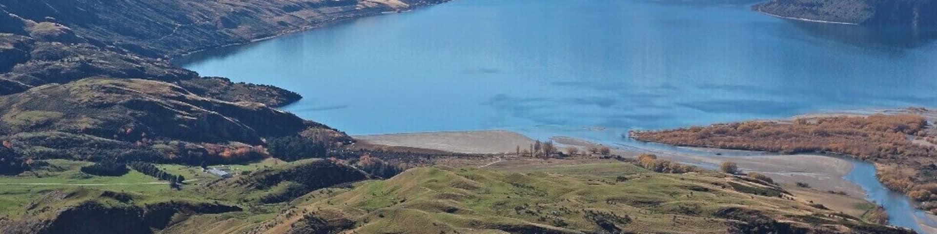 Lake Wanaka is one of New Zealand's most beloved spots. Located in Otago in the center of the South Island, it's a buzzing thriving town next to a beautiful blue glacial lake. On the footsteps of Mt. Aspiring National Park, Wanaka is home to more activities and views than you could ever wish for. From flying in planes and helicopters over the glaciers to hiking in the hills to mountain biking around the lake, there is more to do here than you could ever wish for.