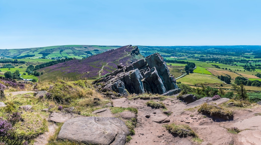 A panorama view across the summit of the Roaches escarpment, Hen Cloud and the Leek Valley, Staffordshire, UK in summertime