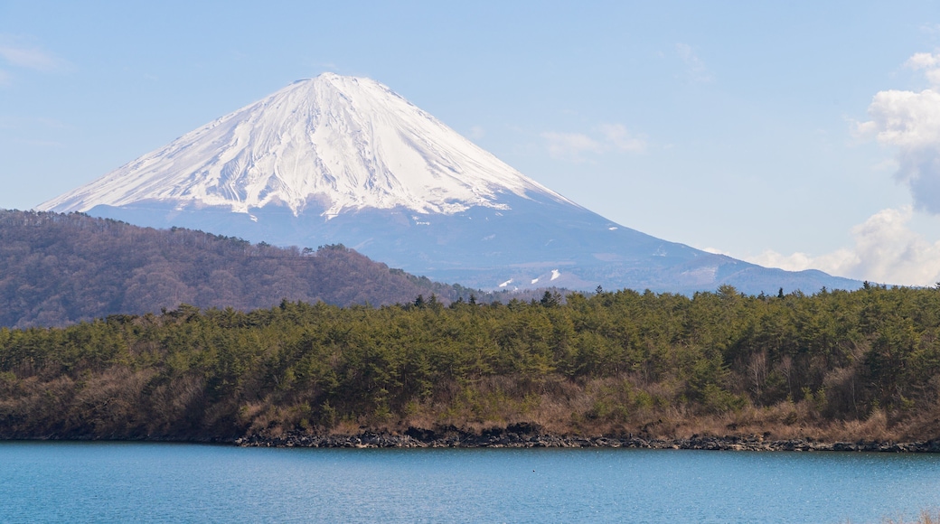 Lake Saiko showing snow, a lake or waterhole and mountains