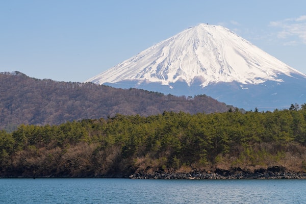 Lake Saiko featuring snow, a lake or waterhole and mountains