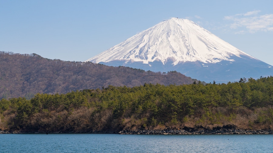 Lake Saiko featuring snow, a lake or waterhole and mountains