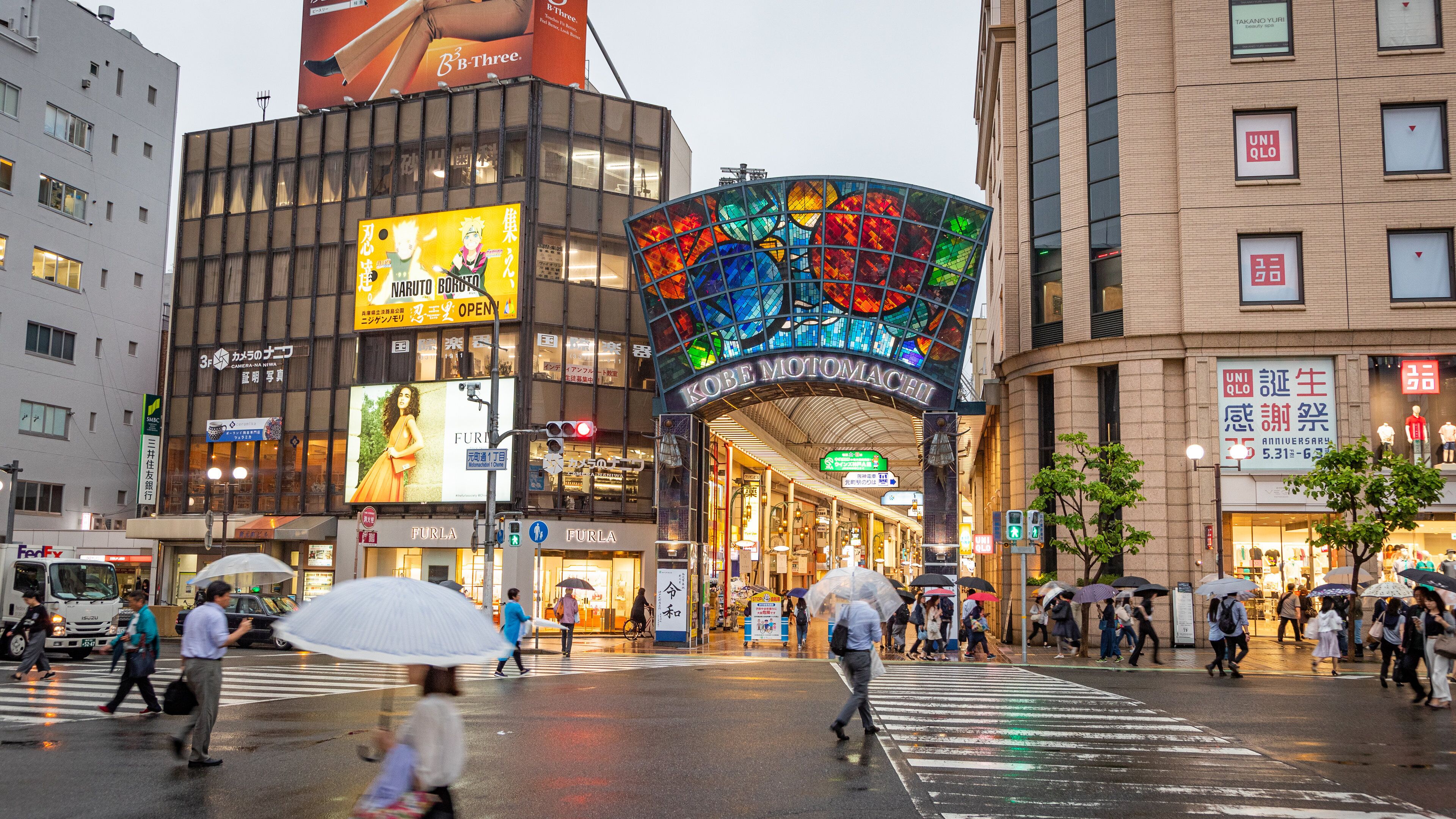 Motomachi Shopping Street showing street scenes and a city