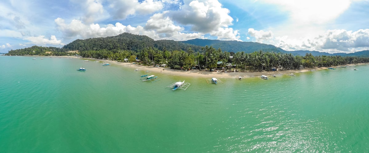 Aerial view of Port Barton Beach on paradise island, tropical travel destination - Port Barton, San Vicente, Palawan, Philippines.