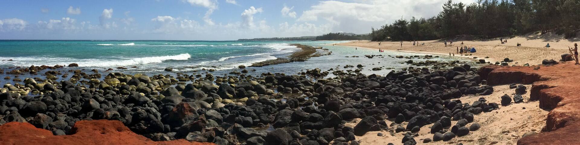 View of Baldwin Beach on Maui, Hawaii's North Shore Over the Lava Rocks on a Sunny Day