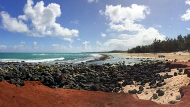 View of Baldwin Beach on Maui, Hawaii's North Shore Over the Lava Rocks on a Sunny Day