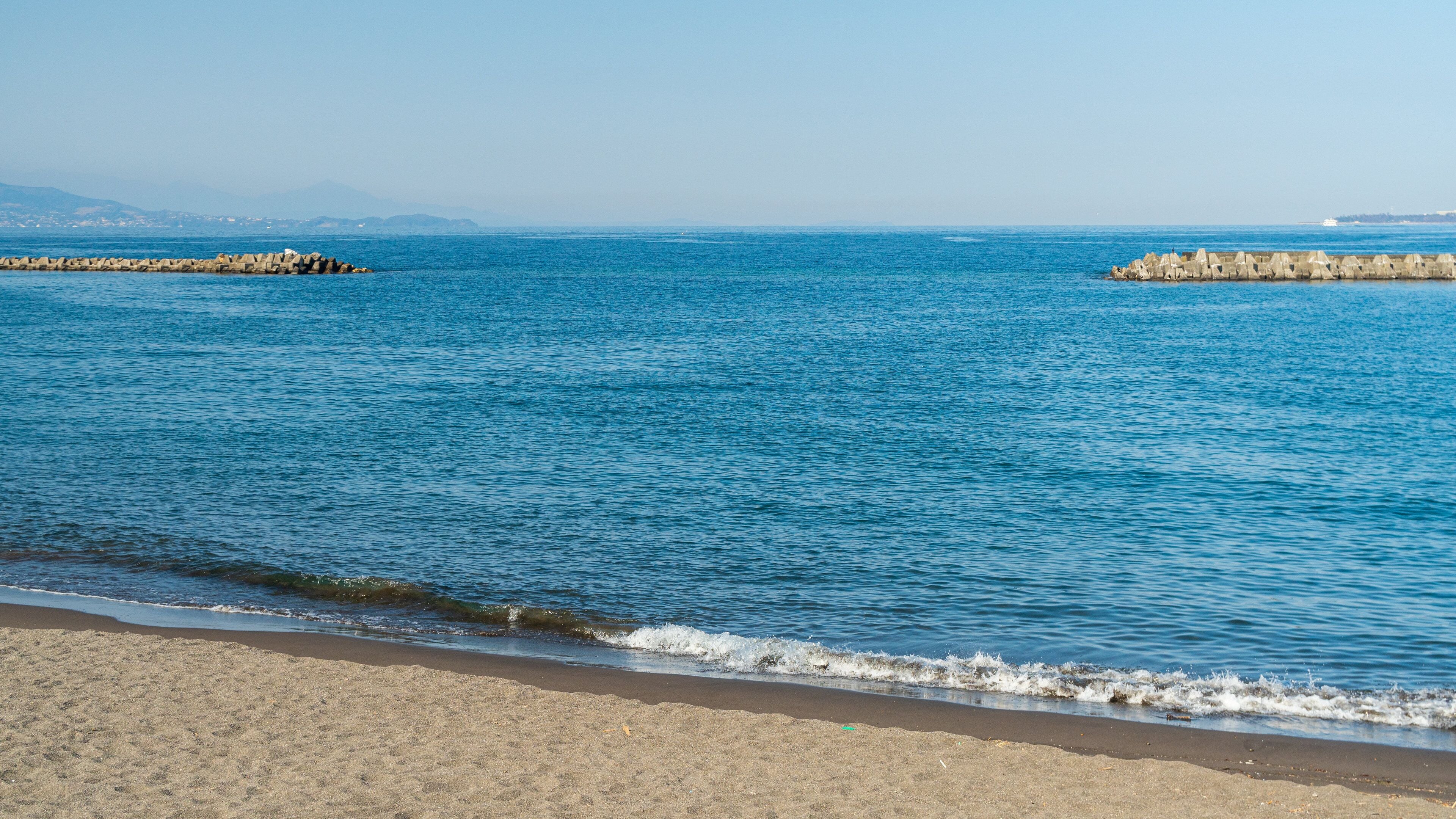 Ito Orange Beach which includes general coastal views and a sandy beach