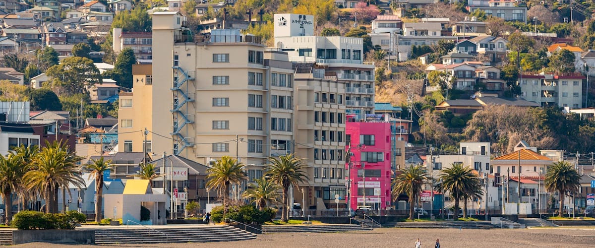 Ito Orange Beach showing a beach and a coastal town