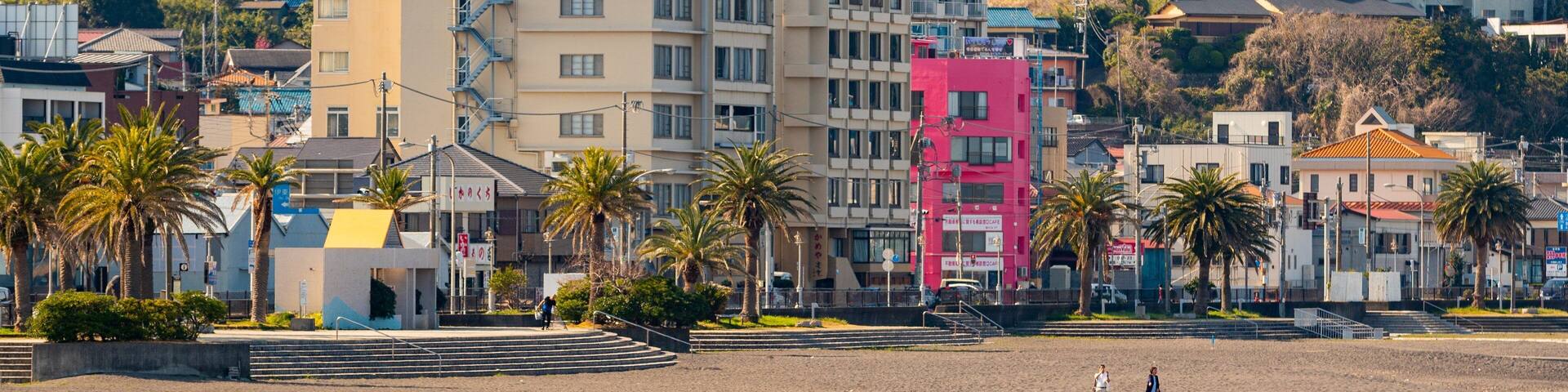 Ito Orange Beach showing a beach and a coastal town