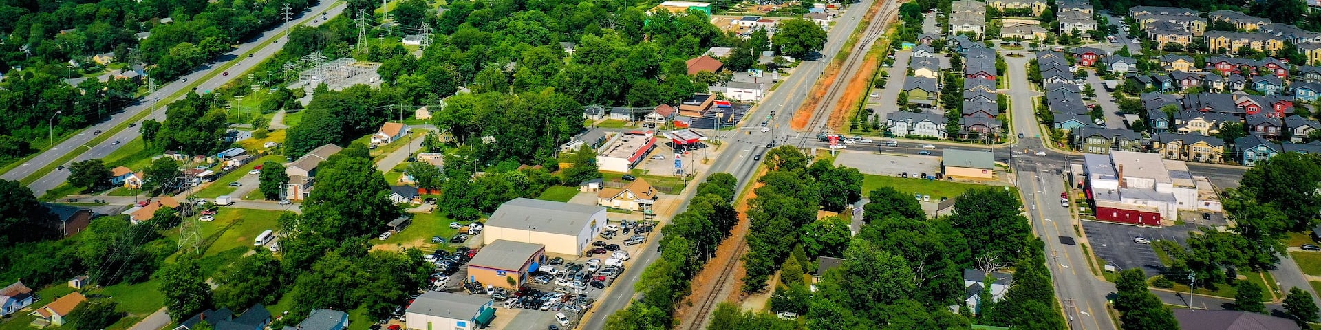 Aerial shot of Greensboro in North Carolina on the horizon from the West
