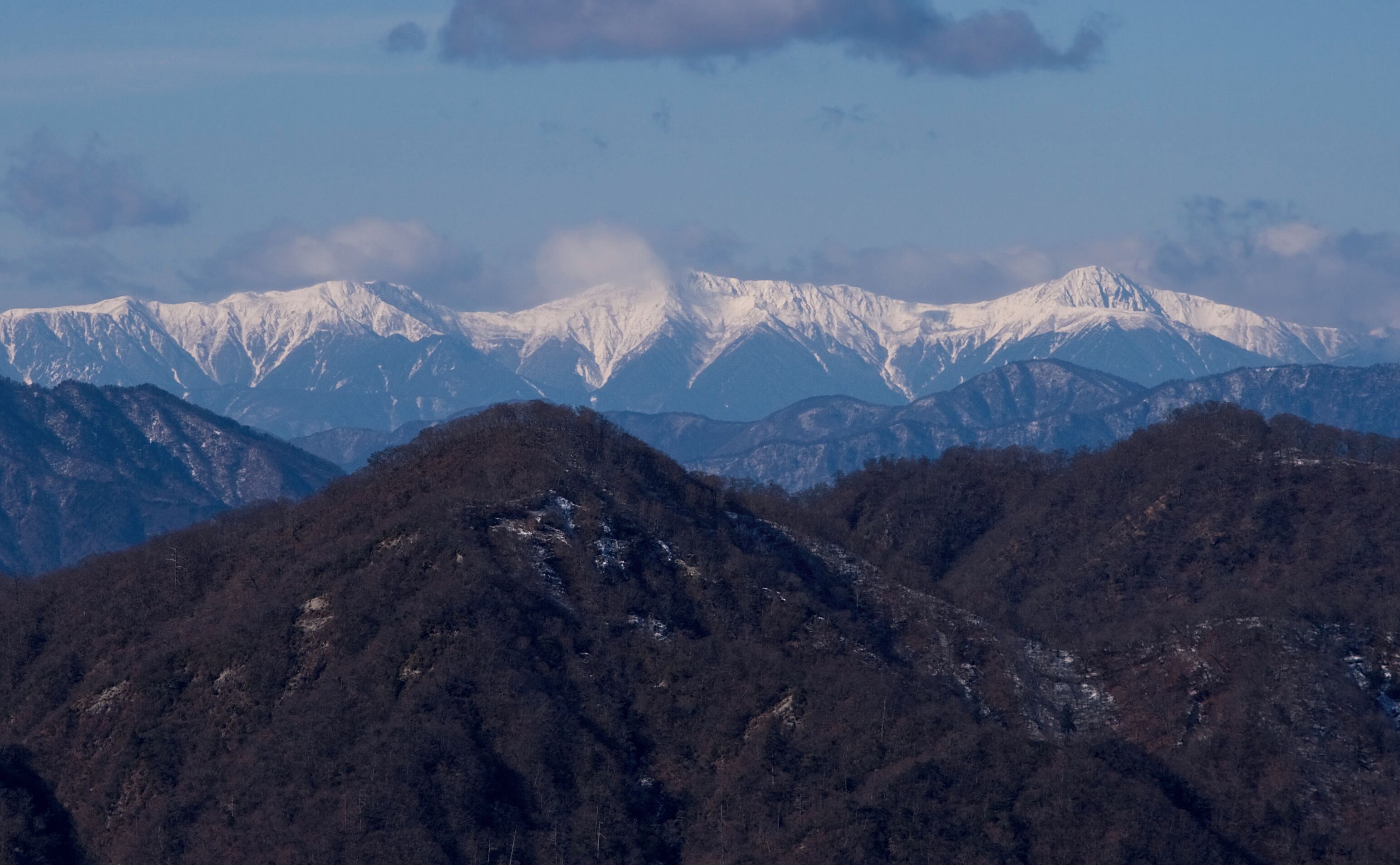 The Shirane Three Mountains (Shirane-sanzan) seen from Mount To
