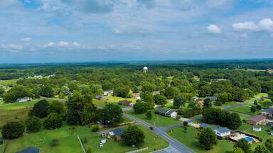 Aerial panoramic view of a Inman small town city near of forest in South Carolina USA