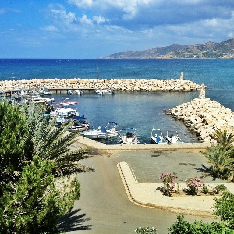 Pomos harbour, Pomos, Cyprus.  Beautiful little fishing harbour located aporox 19 kms from Polis along the coast road.  There is a small beach located near the harbour. It's a little difficult under foot as mostly pebble and stone but worth it for the views 