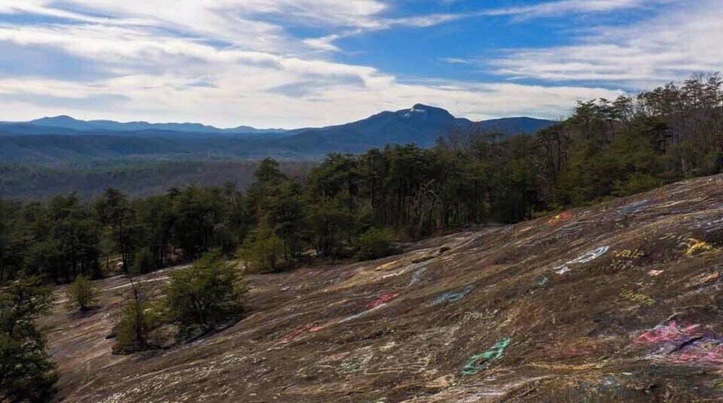 Despite the large amount of graffiti on Bald Rock, it is a nice place to visit. You can't beat the view. For a video guide of Bald Rock, visit: https://www.hdcarolina.com/episode/bald-rock