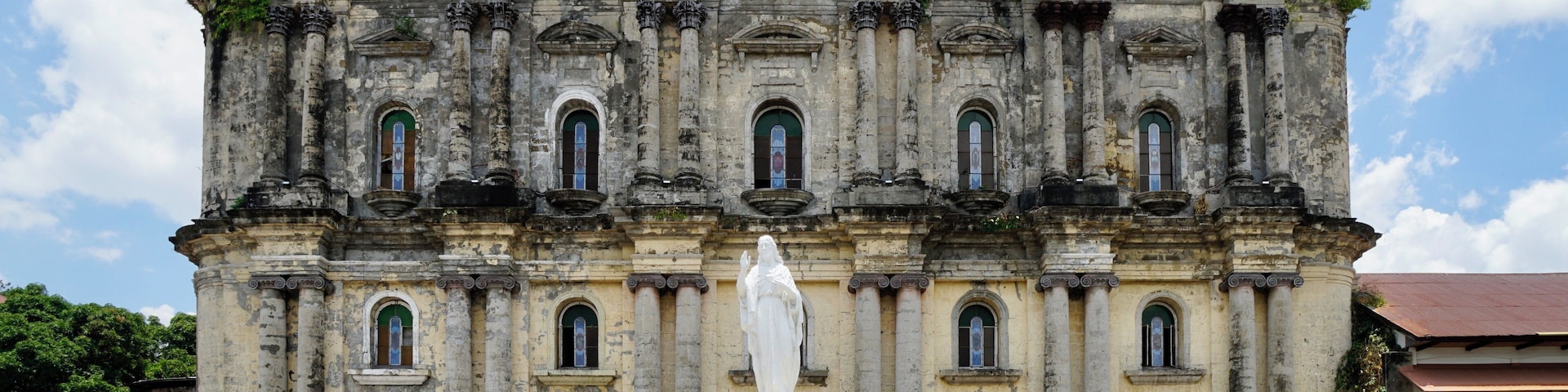 The facade of the Taal Basilica, the Minor Basilica of St Martin of Tours (the Patron Saint of Taal), Taal City, Batangas, Philippines (Apr 2018): though originally founded in the 1570s by the Augustinians, the church has been re-built or restored several times following eruptions of the Taal Volcano and earthquakes.