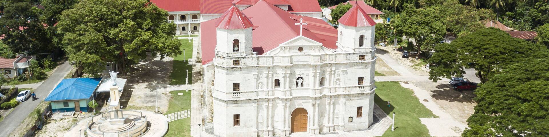 Loon, Bohol, Philippines - The rebuilt Our Lady of Light Church, commonly known as Loon church, with the Bohol strait behind.