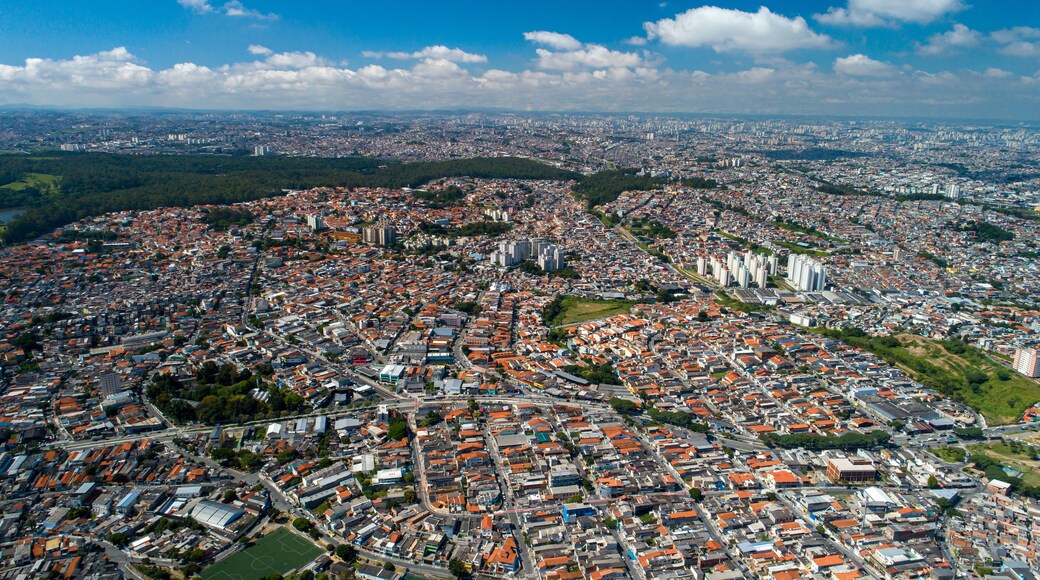 Aerial view of Itaquera, Sao Paulo. Residential buildings, avenues and train