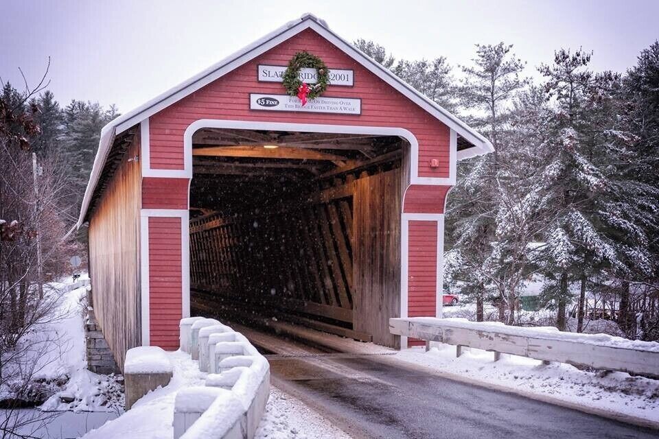 The Slate Covered Bridge is a wooden covered bridge which carries the Westport Village Road over the Ashuelot River in Westport, a village of Swanzey, New Hampshire.
