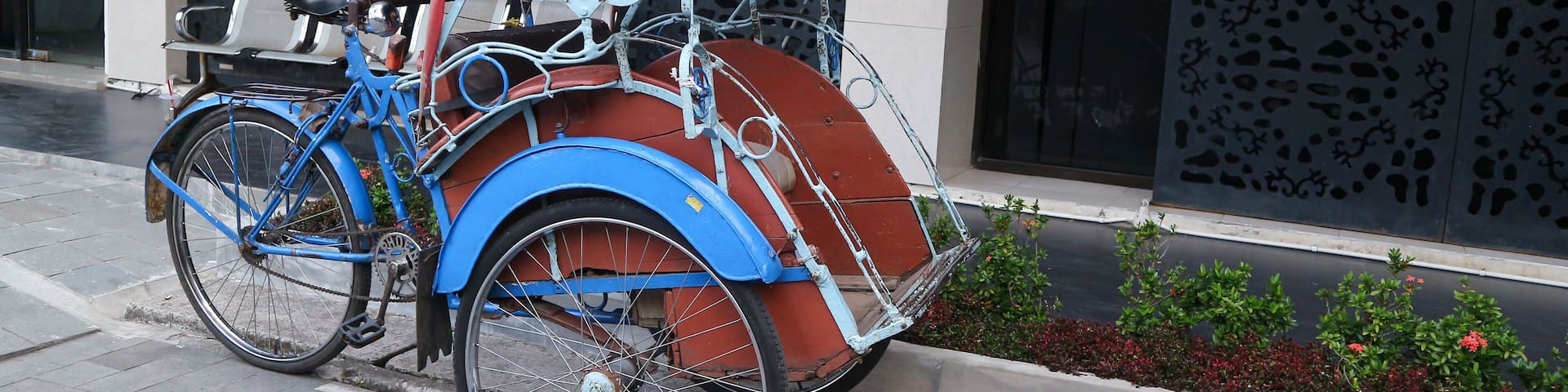 Becak, rickshaw is a traditional vehicle in Indonesia.