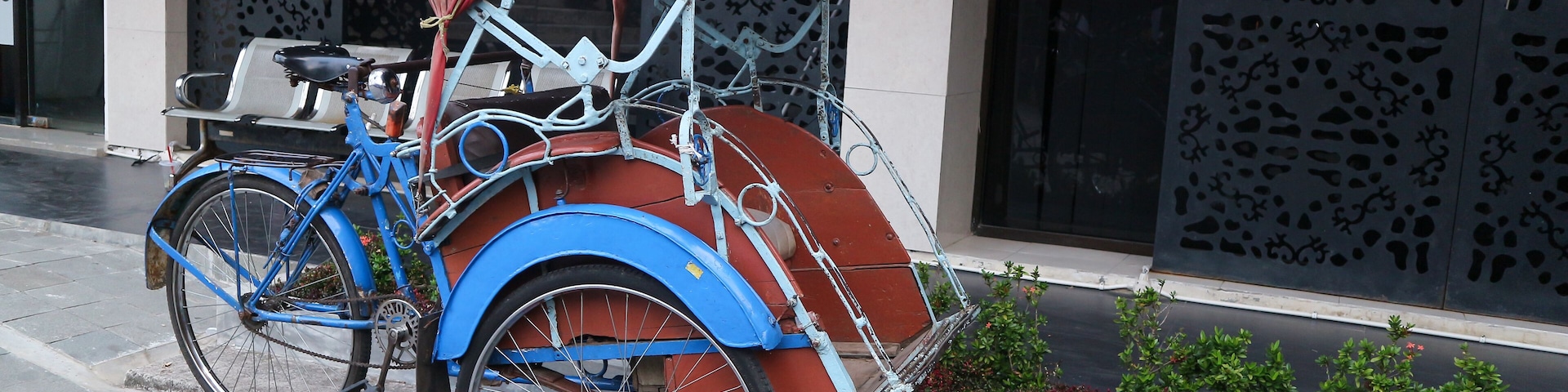 Becak, rickshaw is a traditional vehicle in Indonesia.