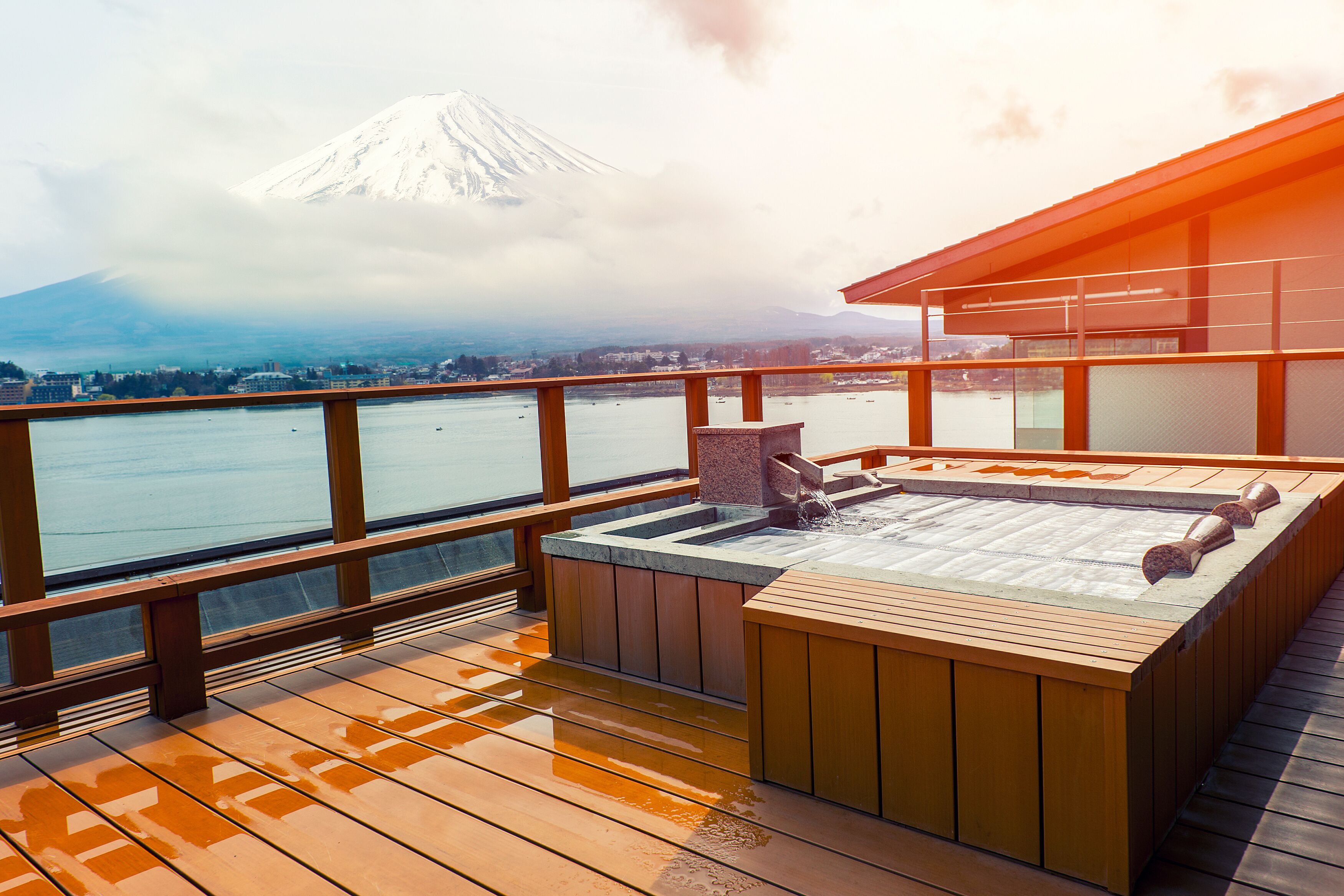 Japanese open air hot spa onsen with a beautiful view of the mountain Fuji