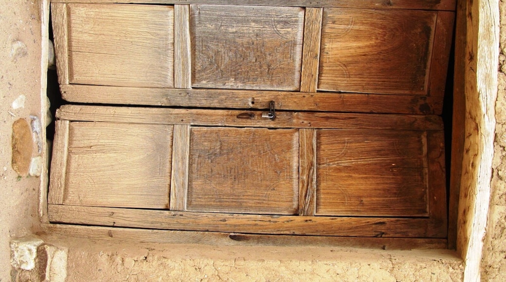 Quite old door in an adobe house.