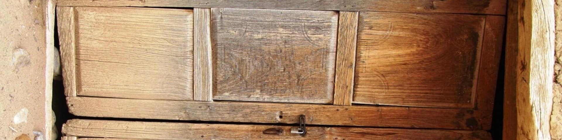Quite old door in an adobe house.