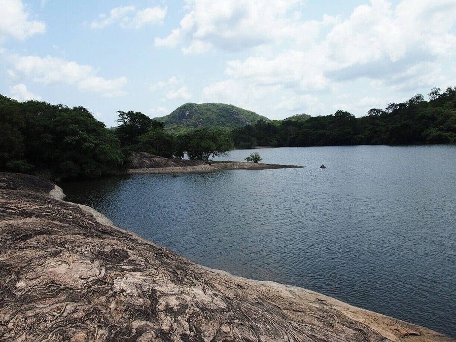 A naturally occurred tank in Galgamuwa. There are thousands of tanks in Sri Lanka. Most of them are man made ones in order to supply water for their cultivation purposes. Agriculture is the main occupation in Sri Lanka. So, tanks are highly useful for the local people.