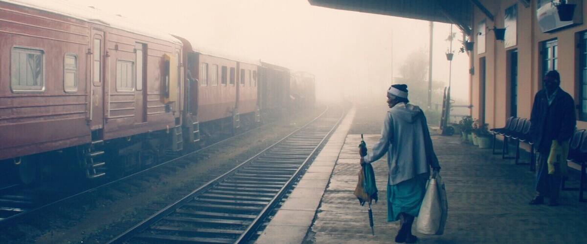 A train coming out of misty and magical 'worlds end' Hillstation Pattipola.